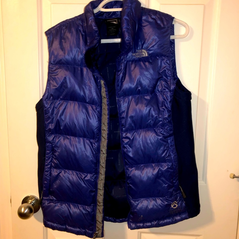 Dark purple North Face Summit Series puffy vest